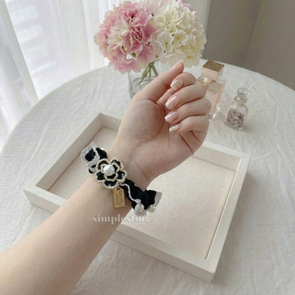 A243- Dây buộc Holly Camellia pearl pleated hair rope